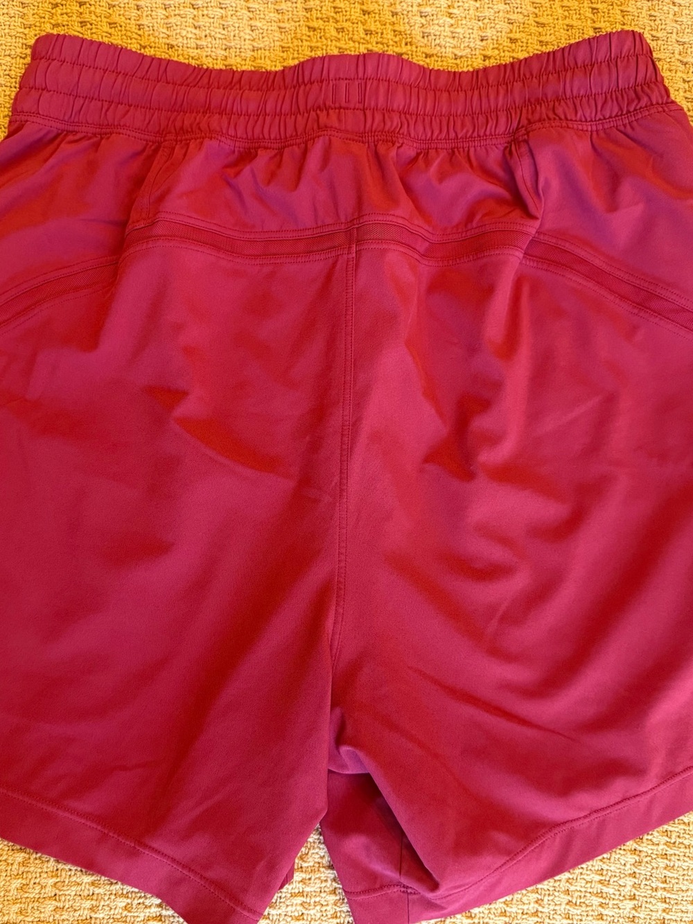 Lululemon Pace Breaker Linerless Short 5" sport red.